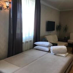 Номер стандарт с 1 двуспальной кроватью и диваном